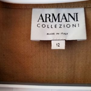 Armani linen jacket. Very smart looking matched up with pants.